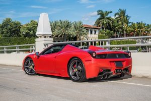 red ferrari 458 italia rear left side view