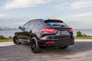 black maserati levante rear left side view