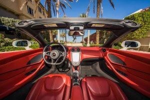 white mclaren 570s red front interior