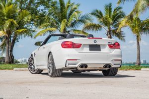 white bmw m4 rear view