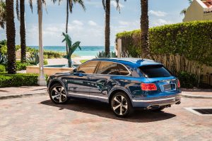 blue bentley bentayga left side view