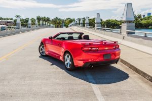 red chevy camaro back view on Mccarter causeway