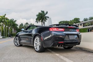 rear view of black chevy camaro ss rental in miami