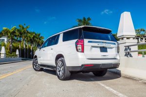 image of white chevy suburban back view thats available for rent in Miami beach