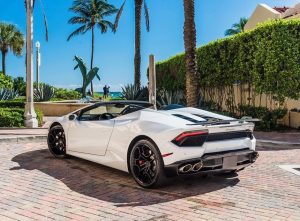 white lamborghini huracán evo left side view