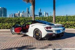 white ferrari f8 tributi side view door open
