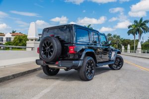 back view of black jeep wrangler being rented in Miami by Rent & Paradise Exotic & Luxury Car Rental