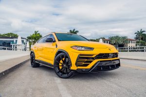 yellow lamborghini urus rental in Miami, FL