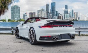 white porsche 911 carrera s (992) back view