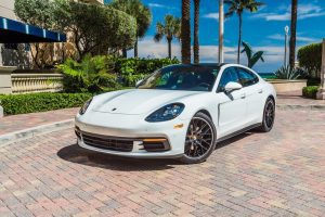 white porsche panamera 4s front left view