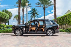 black rolls royce cullinan side view doors open