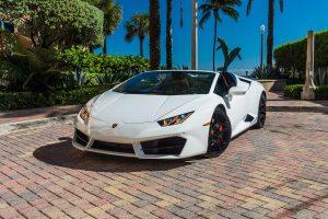 white lamborghini huracán evo left side view