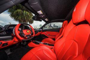 white ferrari f8 tributi red interior driver seat