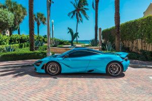 blue mclaren 720s left side view