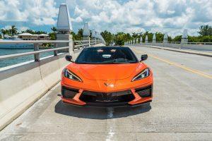 image of front view of orange corvette c8 for rent in Miami FL