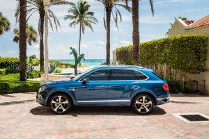 blue bentley bentayga parked in Miami Beach available for rent