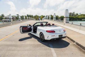 white mercedes benz c300 back view door open