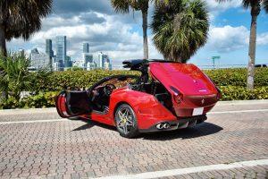 red ferrari 458 italia side view doors open