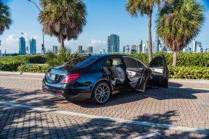 black mercedes benz s550 sedan side view doors open