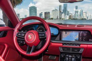 white porsche 911 carrera s (992) red interior center console