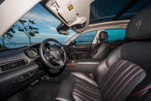 black maserate levante driver seat
