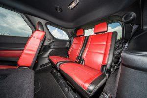 white dodge durango hemi red interior back seat right view
