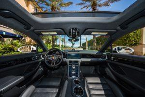 white porsche panamera 4s front interior