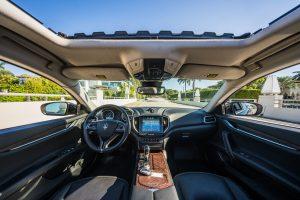 black maserati ghibli front interior
