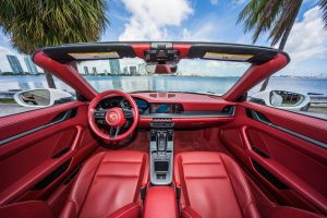 white porsche 911 carrera s (992) red front interior