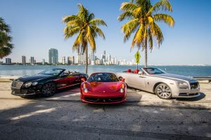 group of luxury cars front view