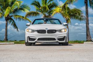 white bmw m4 front view