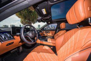 black mercedes benz s580 sedan driver seat brown leather