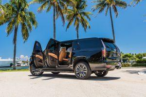 black cadillac escalade brown leather seats side view doors open