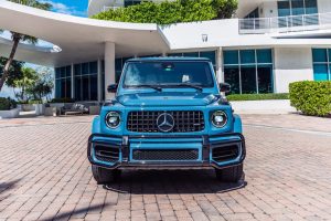 Image of blue Mercedes Benz G63 AMG rental in Miami Beach by Rent & Paradise Exotic & Luxury Car Rental.