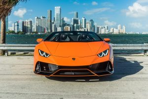front side of Lamborghini Huracan EVO Orange for rent in Miami by Rent & Paradise Exotic & Luxury Car Rental