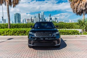 Image of front side of black Range Rover velar rental in Lincoln Road, Miami Beach by Rent & Paradise Exotic & Luxury Car Rental.