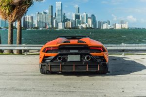 back side of Lamborghini Huracan EVO Orange for rent in Miami by Rent & Paradise Exotic & Luxury Car Rental
